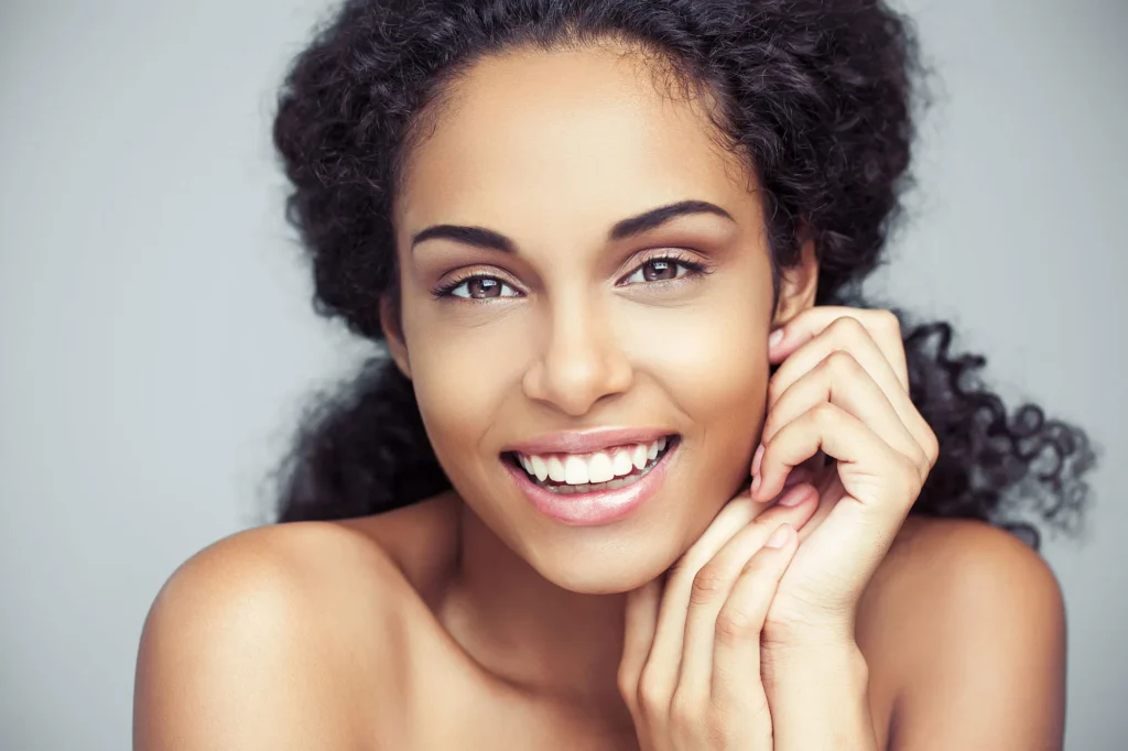 Smiling woman with curly hair