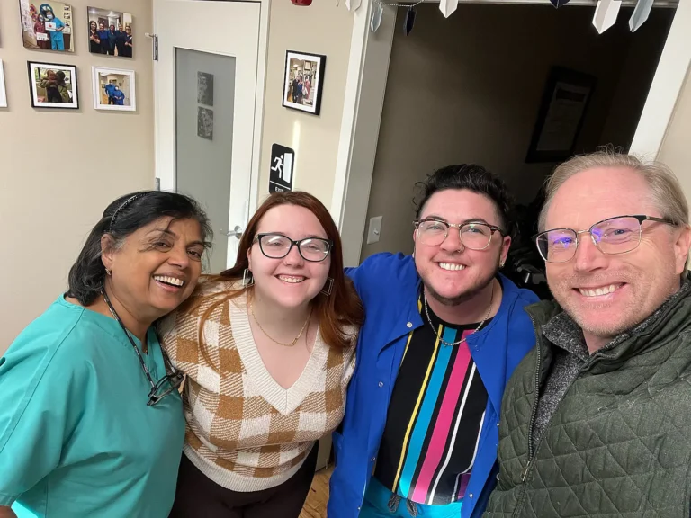Group selfie of patients with a dental team member at MVP Family Dental