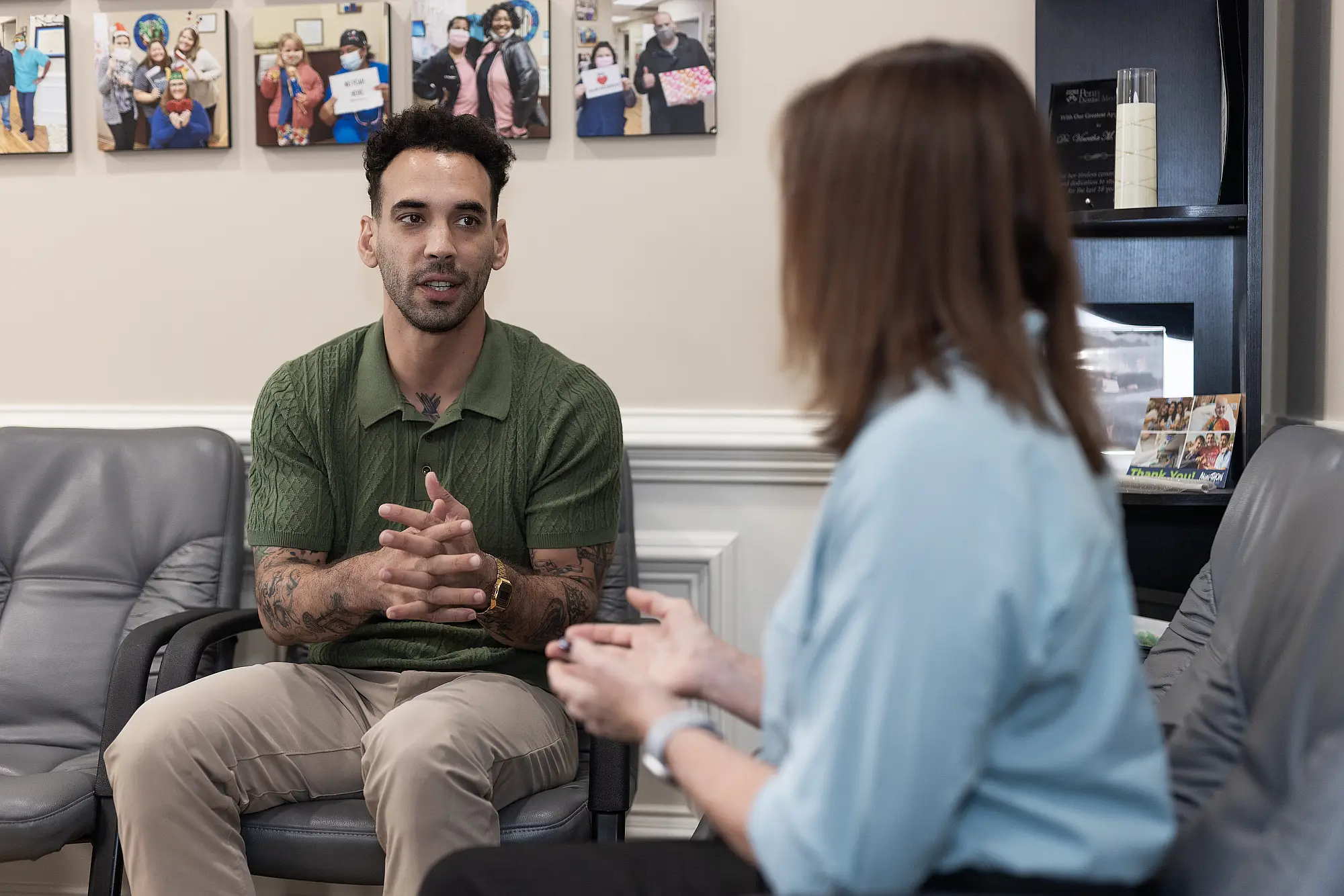 Patient talking with a team member in the waiting room