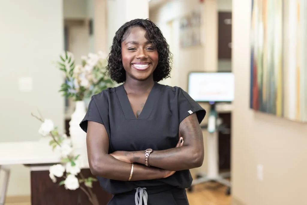 Smiling MVP Family Dental team member in scrubs